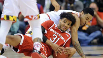 Mar 11, 2016; Indianapolis, IN, USA; Nebraska Cornhusker forward Shavon Shields (31) grabs a loose ball from Maryland Terrapins guard Jared Nickens (11) in the first half during the Big Ten Conference tournament at Bankers Life Fieldhouse. Mandatory Credit: Thomas J. Russo-USA TODAY Sports