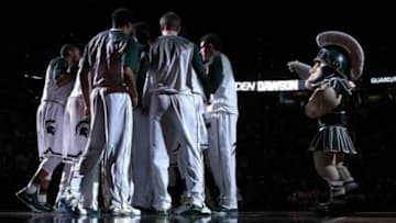 Dec 30, 2014; East Lansing, MI, USA; Michigan State Spartans and mascot Sparty huddle prior to a game against the Maryland Terrapins at Jack Breslin Student Events Center. Mandatory Credit: Mike Carter-USA TODAY Sports