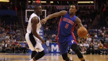 Mar 27, 2015; Orlando, FL, USA; Detroit Pistons guard Kentavious Caldwell-Pope (5) drives to the basket as Orlando Magic guard Victor Oladipo (5) defends during the first half at Amway Center. Mandatory Credit: Kim Klement-USA TODAY Sports
