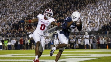 Jahan Dotson #5 of the Penn State Nittany Lions catches a pass for a touchdown against Raheem Layne II #0 of the Indiana Hoosiers during the first half at Beaver Stadium on October 2, 2021 in State College, Pennsylvania. (Photo by Scott Taetsch/Getty Images)