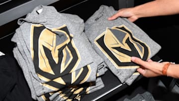 LAS VEGAS, NV - NOVEMBER 22: T-shirts with the team logo for the Vegas Golden Knights are folded and stacked after being announced as the name for the Las Vegas NHL franchise at T-Mobile Arena on November 22, 2016 in Las Vegas, Nevada. The team will begin play in the 2017-18 season. (Photo by Ethan Miller/Getty Images)