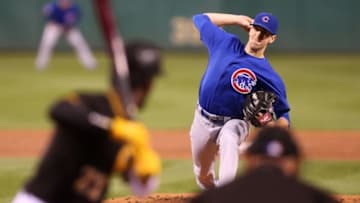 Sep 26, 2016; Pittsburgh, PA, USA; Chicago Cubs starting pitcher Kyle Hendricks (right) delivers a pitch to Pittsburgh Pirates center fielder Andrew McCutchen (left) during the first inning at PNC Park. Mandatory Credit: Charles LeClaire-USA TODAY Sports