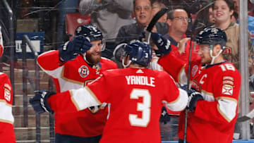 SUNRISE, FL - JANUARY 21: Teammates congratulate Aaron Ekblad # 5 of the Florida Panthers after he scored a first period goal against the San Jose Sharks at the BB&T Center on January 21, 2019 in Sunrise, Florida. (Photo by Joel Auerbach/Icon Sportswire via Getty Images)