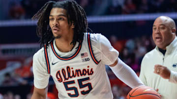CHAMPAIGN, IL - DECEMBER 10: Skyy Clark #55 of the Illinois Fighting Illini dribbles during the game against the Penn State Nittany Lions at State Farm Center on December 10, 2022 in Champaign, Illinois. (Photo by Michael Hickey/Getty Images)