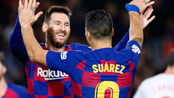 Lionel Messi of FC Barcelona celebrates with Luis Suarez(Photo by Eric Alonso/MB Media/Getty Images)