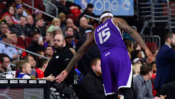 PHILADELPHIA - MARCH 13: DeMarcus Cousins #15 of the Sacramento Kings shakes hands with a young fan against the Philadelphia 76ers at the Wells Fargo Center on March 13, 2015 in Philadelphia, Pennsylvania. NOTE TO USER: User expressly acknowledges and agrees that, by downloading and or using this photograph, User is consenting to the terms and conditions of the Getty Images License Agreement. Mandatory Copyright Notice: Copyright 2015 NBAE (Photo by David Dow/NBAE via Getty Images)