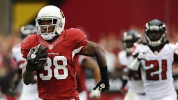 Oct 27, 2013; Phoenix, AZ, USA; Arizona Cardinals running back Andre Ellington (38) runs for an 80 yard touchdown against the Atlanta Falcons in the first half at University of Phoenix Stadium. Mandatory Credit: Jennifer Stewart-USA TODAY Sports