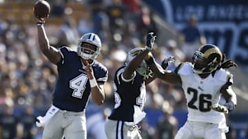 Aug 13, 2016; Los Angeles, CA, USA; Dallas Cowboys quarterback Dak Prescott (4) throws the ball against the Los Angeles Rams during the first quarter at Los Angeles Memorial Coliseum. Mandatory Credit: Kelvin Kuo-USA TODAY Sports