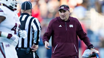 OXFORD, MS - NOVEMBER 26: Head Coach Dan Mullen of the Mississippi State Bulldogs talks with a Referee during a game against the Mississippi Rebels at Vaught-Hemingway Stadium on November 26, 2016 in Oxford, Mississippi. The Bulldogs defeated the Rebels 55-20. (Photo by Wesley Hitt/Getty Images)