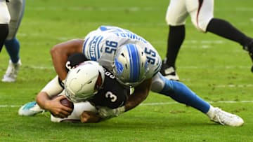 GLENDALE, ARIZONA - DECEMBER 09: Romeo Okwara #95 of the Detroit Lions sacks Josh Rosen #3 of the Arizona Cardinals at State Farm Stadium on December 09, 2018 in Glendale, Arizona. (Photo by Norm Hall/Getty Images)