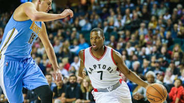 Oct 3, 2016; Calgary, Alberta, CAN; Toronto Raptors guard Kyle Lowry (7) controls the ball against the Denver Nuggets during the first quarter at Scotiabank Saddledome. Mandatory Credit: Sergei Belski-USA TODAY Sports
