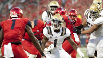 Sep 26, 2015; Tucson, AZ, USA; UCLA Bruins running back Soso Jamabo (1) runs the ball during the second quarter against the Arizona Wildcats at Arizona Stadium. Mandatory Credit: Casey Sapio-USA TODAY Sports