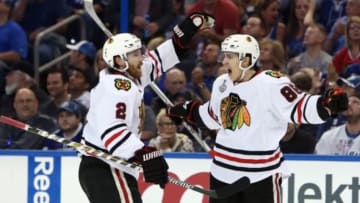 Jun 3, 2015; Tampa, FL, USA; Chicago Blackhawks left wing Teuvo Teravainen (86) celebrates with defenseman Duncan Keith (2) after scoring a goal against the Tampa Bay Lightning in the third period in game one of the 2015 Stanley Cup Final at Amalie Arena. Mandatory Credit: Kim Klement-USA TODAY Sports