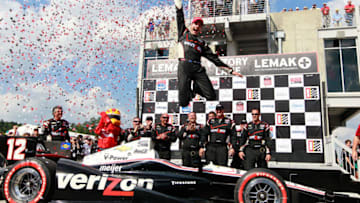 BIRMINGHAM, AL - APRIL 01: Will Power of Australia, driver of the #12 Team Penske Chevrolet, celebrates after winning the IndyCar Series Honda Indy Grand Prix of Alabama presented by Legacy at Barber Motorsports Park on April 1, 2012 in Birmingham, Alabama. (Photo by Kevin C. Cox/Getty Images)