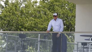 Jun 17, 2014; Dallas, TX, USA; Dallas Cowboys owner Jerry Jones watches from a skybox during minicamp at Cowboys headquarters at Valley Ranch. Mandatory Credit: Matthew Emmons-USA TODAY Sports