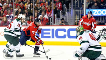 WASHINGTON, DC - MARCH 22: Minnesota Wild goaltender Devan Dubnyk (40) gives up a second period goal by Washington Capitals right wing Brett Connolly (10) on March 22, 2019, at the Capital One Arena in Washington, D.C. (Photo by Mark Goldman/Icon Sportswire via Getty Images)