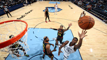 MEMPHIS, TN - OCTOBER 5: Jaren Jackson Jr. #13 of the Memphis Grizzlies shoots the ball against the Atlanta Hawks on October 5, 2018 at FedExForum in Memphis, Tennessee. NOTE TO USER: User expressly acknowledges and agrees that, by downloading and or using this photograph, User is consenting to the terms and conditions of the Getty Images License Agreement. Mandatory Copyright Notice: Copyright 2018 NBAE (Photo by Joe Murphy/NBAE via Getty Images)