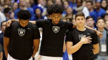 DURHAM, NC - MARCH 03: Teammates Marques Bolden