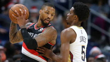 Damian Lillard #0 of the Portland Trail Blazers drives against Herbert Jones #5 of the New Orleans Pelicans (Photo by Jonathan Bachman/Getty Images)