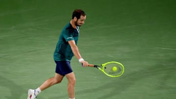 France's Richard Gasquet returns the ball to Gael Monfils of France during the quarter-finals of the Dubai Duty Free Tennis Championship in the Gulf emirate of Dubai on February 27, 2020. (Photo by - / AFP) (Photo by -/AFP via Getty Images)