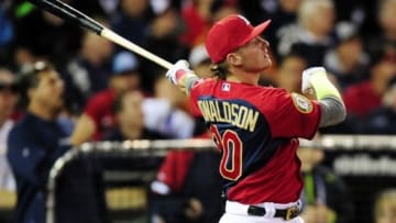 Jul 14, 2014; Minneapolis, MN, USA; American League infielder Josh Donaldson (20) of the Oakland Athletics at bat in the first round during the 2014 Home Run Derby the day before the MLB All Star Game at Target Field. Mandatory Credit: Jeff Curry-USA TODAY Sports