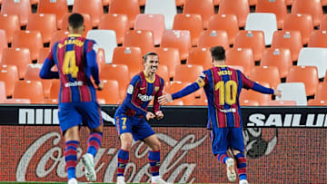 Antoine Griezmann of FC Barcelona celebrates with team mate Lionel Messi. (Photo by Aitor Alcalde Colomer/Getty Images)