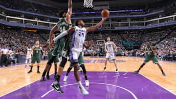SACRAMENTO, CA - MARCH 22: Buddy Hield #24 of the Sacramento Kings puts up a shot against Giannis Antetokounmpo #34 of the Milwaukee Bucks on March 22, 2017 at Golden 1 Center in Sacramento, California. NOTE TO USER: User expressly acknowledges and agrees that, by downloading and or using this photograph, User is consenting to the terms and conditions of the Getty Images Agreement. Mandatory Copyright Notice: Copyright 2017 NBAE (Photo by Rocky Widner/NBAE via Getty Images)