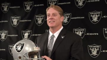 Jan 16, 2015; Alameda, CA, USA; Jack Del Rio poses with helmet at press conference to announce his hiring as Oakland Raiders head coach at the Raiders practice facility. Mandatory Credit: Kirby Lee-USA TODAY Sports