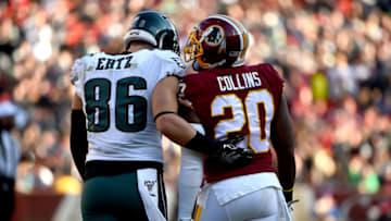 LANDOVER, MD - DECEMBER 15: Zach Ertz #86 of the Philadelphia Eagles and Landon Collins #20 of the Washington Redskins speak during the first half at FedExField on December 15, 2019 in Landover, Maryland. (Photo by Will Newton/Getty Images)