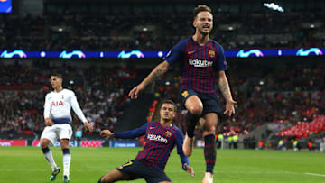 LONDON, ENGLAND - OCTOBER 03: Philippe Coutinho of Barcelona looks dejected and Ivan Rakitic of Barcelona shouts in frustration as the ball goes out of play during the Group B match of the UEFA Champions League between Tottenham Hotspur and FC Barcelona at Wembley Stadium on October 3, 2018 in London, United Kingdom. (Photo by Charlotte Wilson/Offside/Getty Images)