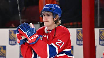 MONTREAL, CANADA - NOVEMBER 11: Kaiden Guhle #21 of the Montreal Canadiens celebrates his overtime goal against the Boston Bruins at the Bell Centre on November 11, 2023 in Montreal, Quebec, Canada. The Montreal Canadiens defeated the Boston Bruins 3-2 in overtime. (Photo by Minas Panagiotakis/Getty Images)