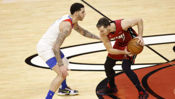 MIAMI, FLORIDA - DECEMBER 25: Goran Dragic #7 of the Miami Heat is defended by Lonzo Ball #2 of the New Orleans Pelicans during the fourth quarter at American Airlines Arena on December 25, 2020 in Miami, Florida. NOTE TO USER: User expressly acknowledges and agrees that, by downloading and or using this photograph, User is consenting to the terms and conditions of the Getty Images License Agreement. (Photo by Michael Reaves/Getty Images)