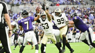 Aug 14, 2021; Baltimore, Maryland, USA; New Orleans Saints linebacker Zack Baun (53) and defensive tackle Shy Tuttle (99) rush Baltimore Ravens quarterback Trace McSorley (7) during the first quarter at M&T Bank Stadium. Mandatory Credit: Tommy Gilligan-USA TODAY Sports