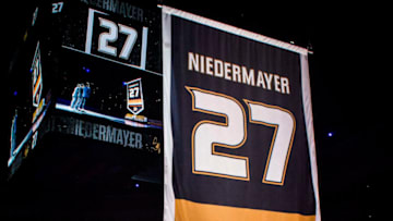 ANAHEIM, CA - FEBRUARY 17: Former Anaheim Duck, Scott Niedermayer watches his jersey rise to the rafters with his family during the jersey retirement ceremony prior to the game between the Anaheim Ducks and the Boston Bruins on February 17, 2019 at Honda Center in Anaheim, California. (Photo by Foster Snell/NHLI via Getty Images)