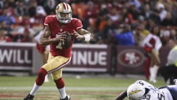 August 30, 2012; San Francisco, CA, USA; San Francisco 49ers quarterback Colin Kaepernick (7) controls the ball against San Diego Chargers linebacker Darryl Gamble (53) during the second quarter at Candlestick Park. Mandatory Credit: Kelley L Cox-USA TODAY Sports