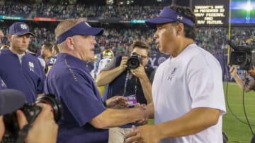 SAN DIEGO, CA - OCTOBER 27: Head coach Brian Kelly of the Notre Dame Fighting Irish greets head coach Ken Niumatalolo the Navy Midshipmen at mid-field following their game at SDCCU Stadium on October 27, 2018 in San Diego, California. (Photo by Kent Horner/Getty Images)