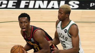 Onyeka Okongwu #17 of the Atlanta Hawks is defended by Mamadi Diakite #25 of the Milwaukee Bucks during the second half in game two of the Eastern Conference Finals at Fiserv Forum on June 25, 2021 in Milwaukee, Wisconsin. NOTE TO USER: User expressly acknowledges and agrees that, by downloading and or using this photograph, User is consenting to the terms and conditions of the Getty Images License Agreement. (Photo by Stacy Revere/Getty Images)