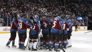 DENVER, CO - APRIL 16: Members of the Colorado Avalanche congratulate Colorado Avalanche goalie Jonathan Bernier (45) following a win after a first round playoff game between the Colorado Avalanche and the visiting Nashville Predators on April 16, 2018 at the Pepsi Center in Denver, CO. (Photo by Russell Lansford/Icon Sportswire via Getty Images)