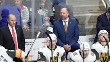 Feb 20, 2022; San Jose, California, USA; Vegas Golden Knights head coach Pete DeBoer talks on the bench during the third period against the San Jose Sharks at SAP Center at San Jose. Mandatory Credit: Darren Yamashita-USA TODAY Sports