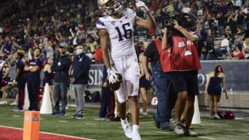 Oct 22, 2021; Tucson, Arizona, USA; Washington Huskies wide receiver Rome Odunze (16) celebrates his touchdown catch against the Arizona Wildcats during the second half at Arizona Stadium. Mandatory Credit: Joe Camporeale-USA TODAY Sports