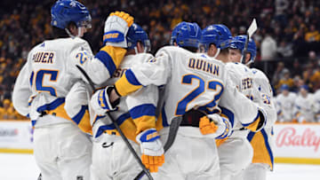 Jan 14, 2023; Nashville, Tennessee, USA; Buffalo Sabres players celebrate after a goal by left wing Victor Olofsson (71) during the second period against the Nashville Predators at Bridgestone Arena. Mandatory Credit: Christopher Hanewinckel-USA TODAY Sports