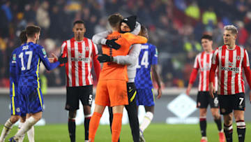 BRENTFORD, ENGLAND - DECEMBER 22: Thomas Tuchel, Manager of Chelsea embraces Kepa Arrizabalaga of Chelsea following the Carabao Cup Quarter Final match between Brentford and Chelsea at Brentford Community Stadium on December 22, 2021 in Brentford, England. (Photo by Catherine Ivill/Getty Images)