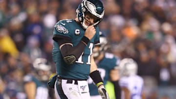 PHILADELPHIA, PENNSYLVANIA - DECEMBER 22: Carson Wentz #11 of the Philadelphia Eagles reacts during the second half against the Dallas Cowboys in the game at Lincoln Financial Field on December 22, 2019 in Philadelphia, Pennsylvania. (Photo by Mitchell Leff/Getty Images)