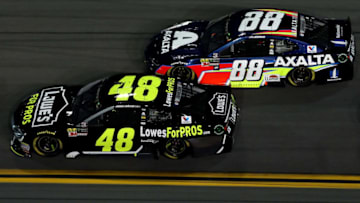 DAYTONA BEACH, FL - JULY 07: Jimmie Johnson, driver of the #48 Lowe's for Pros Chevrolet, races Alex Bowman, driver of the #88 Axalta Chevrolet (Photo by Sean Gardner/Getty Images)