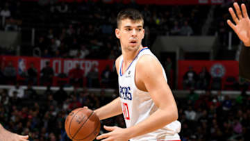 LOS ANGELES, CA - MARCH 11: Ivica Zubac #40 of the LA Clippers handles the ball during the game against the Boston Celtics on March 11, 2019 at STAPLES Center in Los Angeles, California. NOTE TO USER: User expressly acknowledges and agrees that, by downloading and/or using this Photograph, user is consenting to the terms and conditions of the Getty Images License Agreement. Mandatory Copyright Notice: Copyright 2019 NBAE (Photo by Andrew D. Bernstein/NBAE via Getty Images)