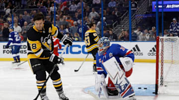 TAMPA, FL - JANUARY 27: {L-R} Kris Letang (Photo by Mike Carlson/Getty Images)