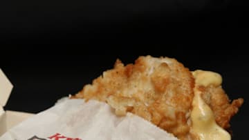 AUCKLAND, NEW ZEALAND - MAY 10: The new Double Down bunless burger is displayed on May 10, 2011 in Auckland, New Zealand. The KFC 'Double Down' is a 604-calorie 'bunless' burger that consists of two strips of bacon, cheese and 'special sauce' served between two KFC chicken fillets and has been a hot topic after being condemned by nutritionists concerned with the high calorie and saturated fat content. (Photo by Sandra Mu/Getty Images)