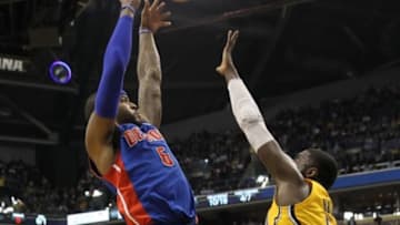 Apr 2, 2014; Indianapolis, IN, USA; Detroit Pistons forward Josh Smith (6) and Indiana Pacers center Roy Hibbert (55) battle for a rebound during the second quarter at Bankers Life Fieldhouse. The Pacers won 101-94. Mandatory Credit: Pat Lovell-USA TODAY Sports