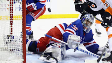 Henrik Lundqvist #30 of the New York Rangers makes the save. (Photo by Bruce Bennett/Getty Images)