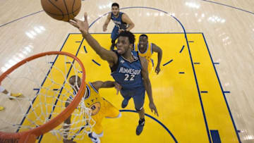 April 5, 2016; Oakland, CA, USA; Minnesota Timberwolves guard Andrew Wiggins (22) shoots the basketball against the Golden State Warriors during the second half at Oracle Arena. The Timberwolves defeated the Warriors 124-117. Mandatory Credit: Kyle Terada-USA TODAY Sports